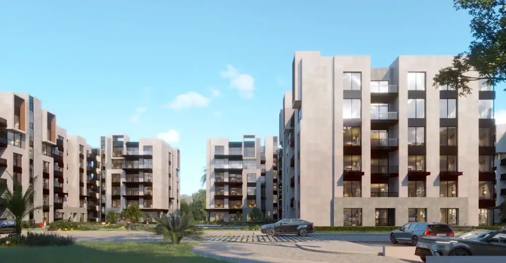 Contemporary apartment buildings at Orla Residence with landscaped surroundings.