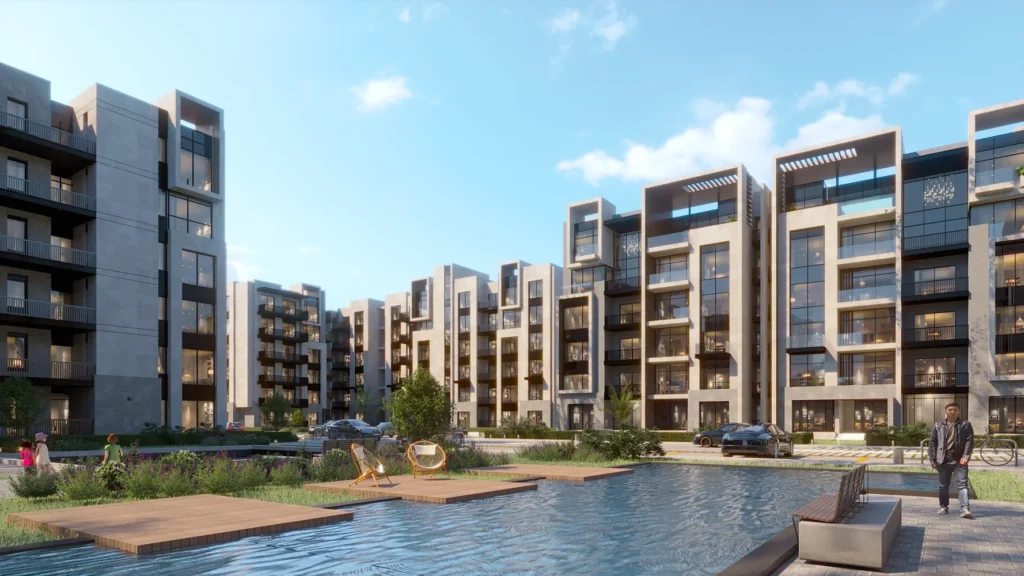 Contemporary apartment complex with pool and landscaped gardens.