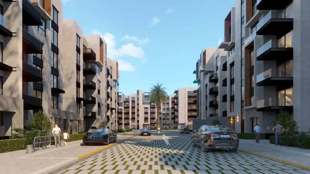 Contemporary apartment complex with parking and landscaped walkways.