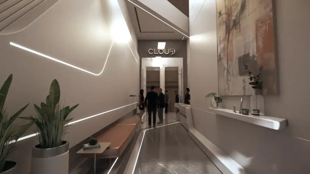 Modern lobby entrance of iCapital Business Complex with sleek design and lighting.