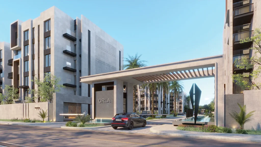 Modern residential entrance with landscaped surroundings and a sleek gate design.