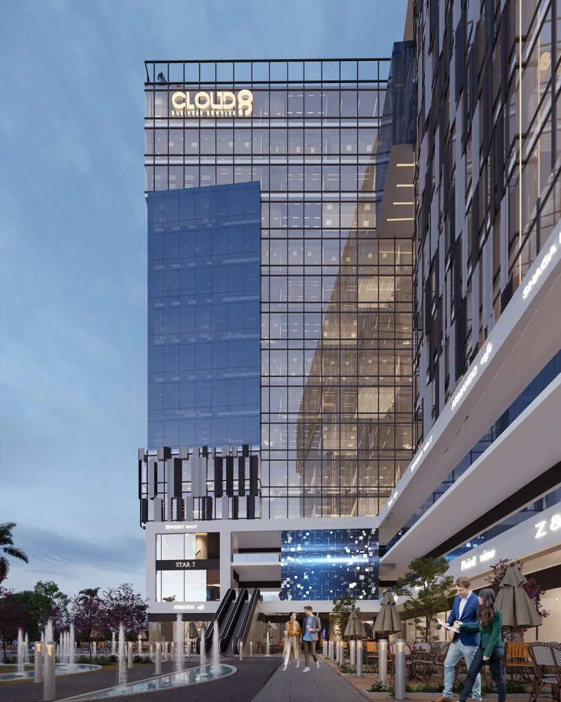 Modern glass skyscraper at i8 Business Complex with retail and office spaces.