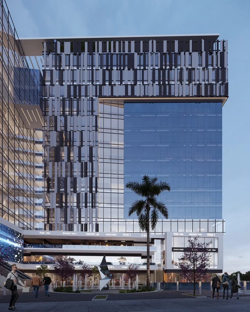 Modern glass office building with palm trees in front, part of iCapital developments.