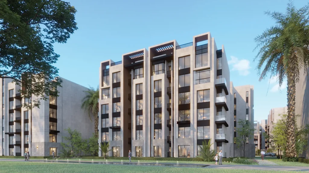 Modern residential building with balconies and lush landscaping in a sunny setting.
