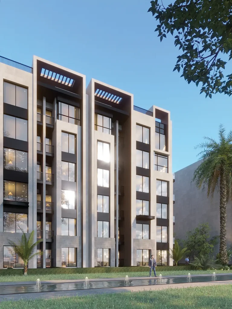 Contemporary apartment building with balconies and large windows in a lush setting.