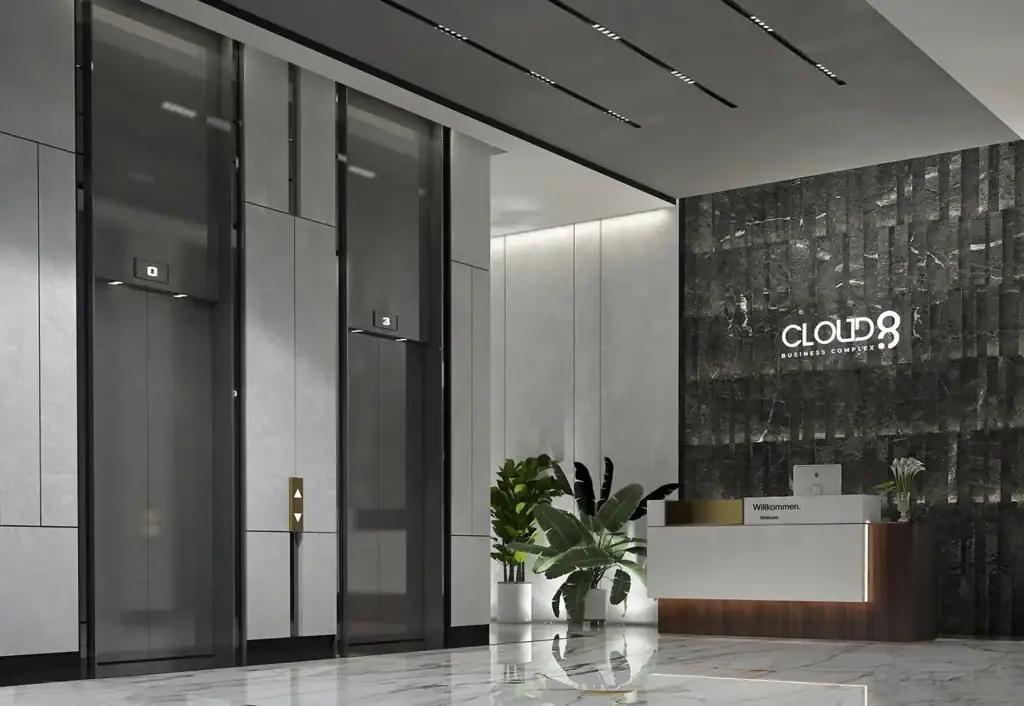 Modern office lobby with elevators and reception desk at iCapital.